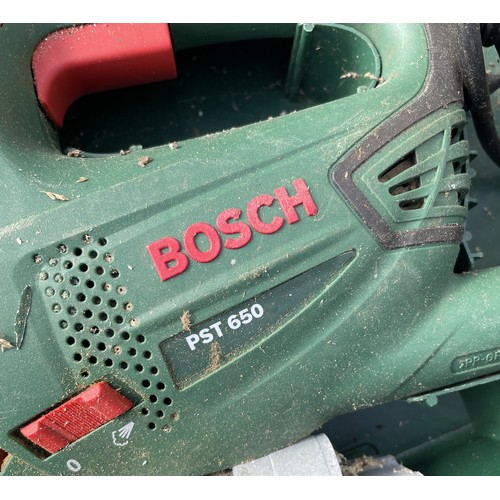 17 - A large collection of tools to include a JCB Grinder, a Black & Decker sander KA250K, a Dewalt D... 