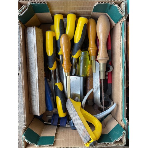 22 - Two boxes of carpenters tools, including chisels and marking gauges.