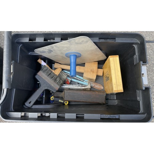 28 - Two large plastic rolling tool boxes filled with tools, including a joiners brace, Record tin snips ... 