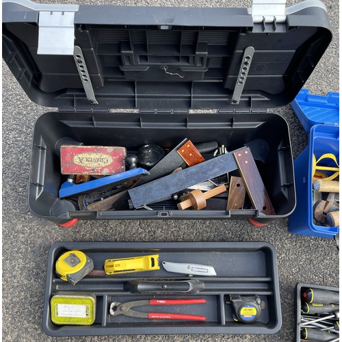 29 - Three large tool boxes having, Stanley saws, Elliot Lucas pincers and other items.