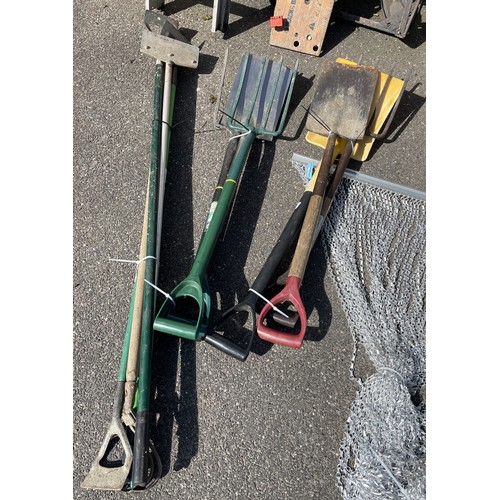 38 - A large collection of gardening tools, wooden stools, ladders, amongst other items.