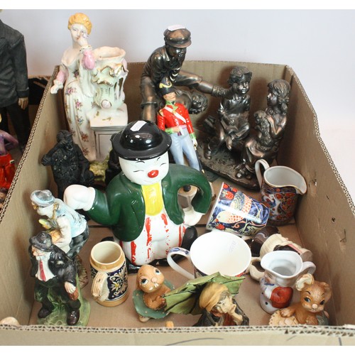59 - A collection of mid twentieth century and later resin and cerasmic figurines to include, 'Laurel and... 