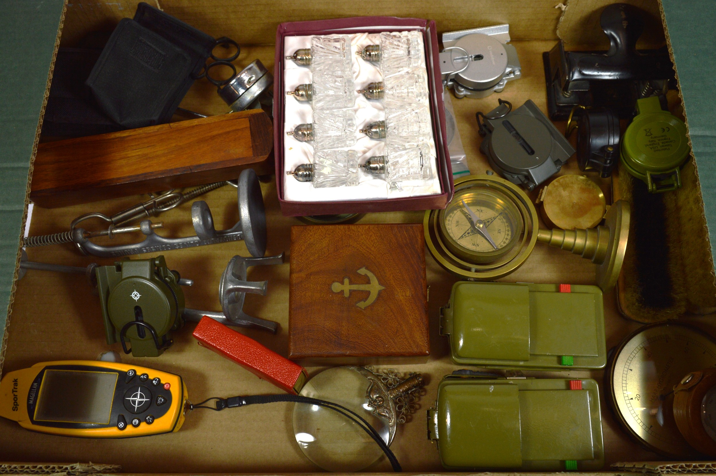 A collection of compass to include six lensatic compass, a brass ...