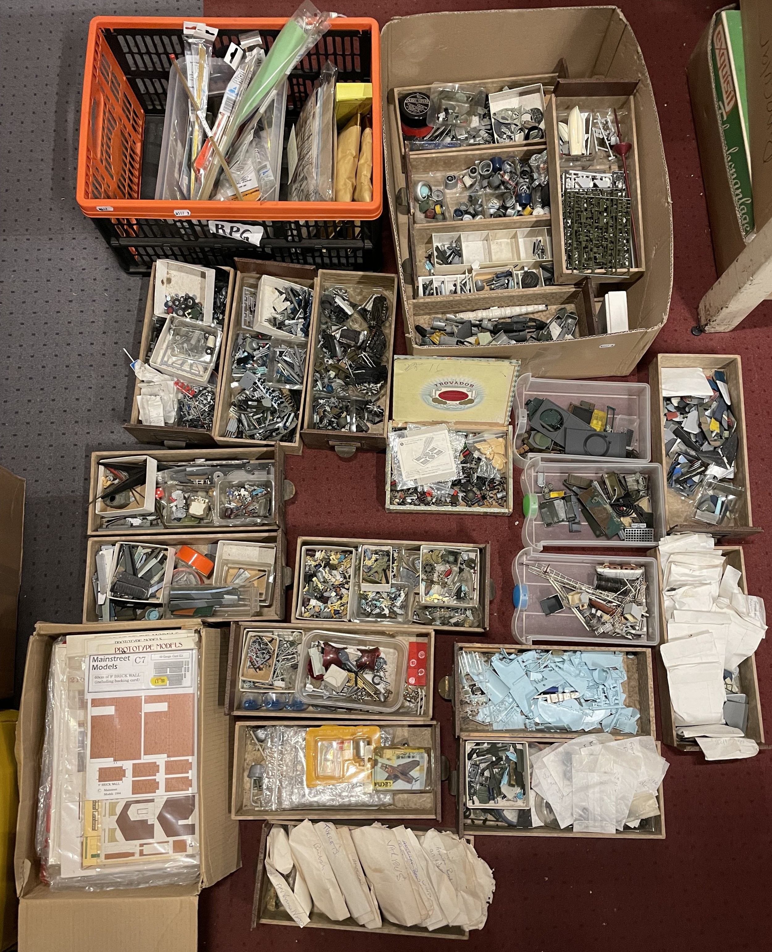 Three boxes of aircraft model parts. (3)