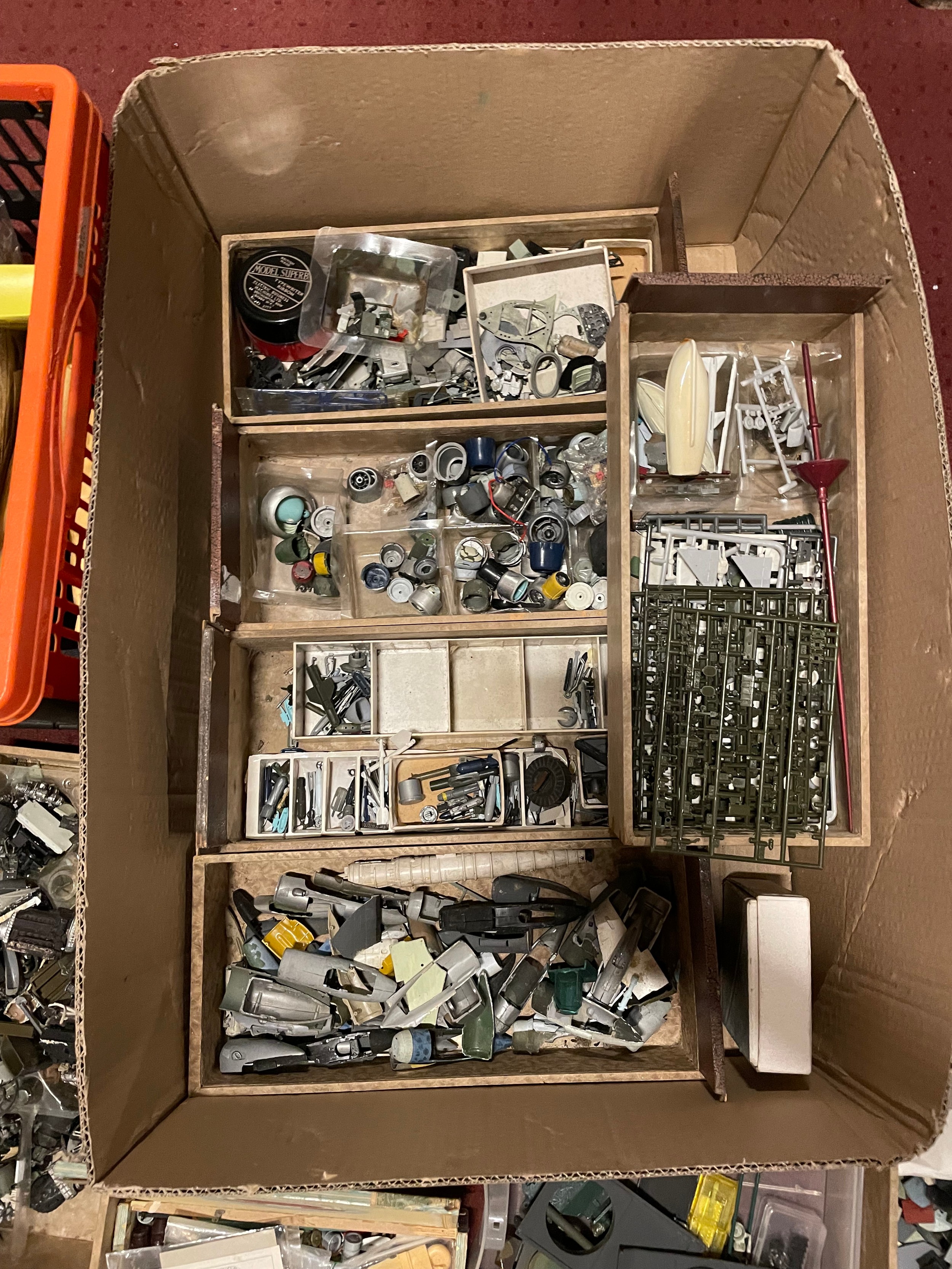 Three boxes of aircraft model parts. (3)