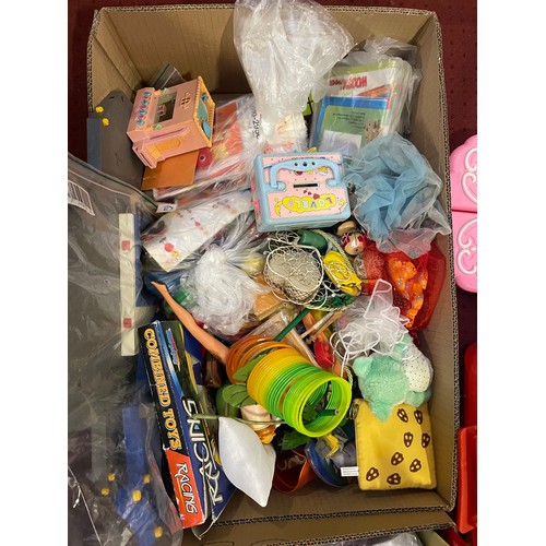 A large assortment of children's toys, character figures and games in ...
