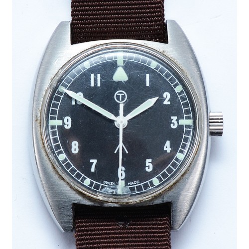An RAF issued 'lost navigator' stainless steel tonneau manual wind gentleman's wristwatch, c. 1976, inscribed "6BB-6645, 99-5238290, 007/76" to back case, having fabric strap, approximately 2000 pieces of these sterile dial watches were produced, most 'lost navigators' were attributed to Hamilton until the mid 1970's before CWC took over towards the 80's, with this being issued between the terms of both manufacturers.
Watch working when catalogued, having chips to crystal at 6 and 10'clock,