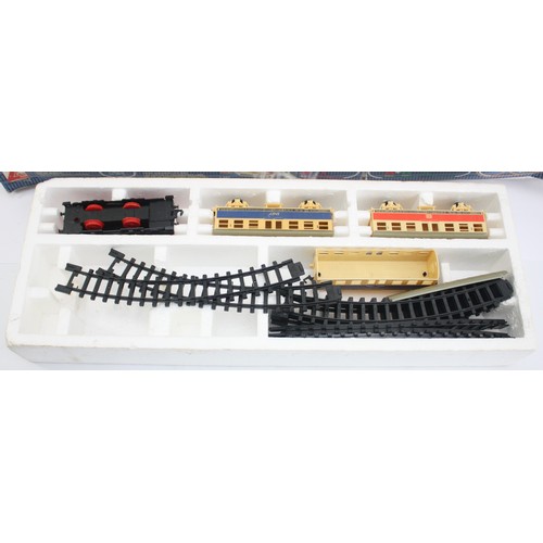 19 - A group of five boxed continental model railway sets, together with a battery operated model railway... 
