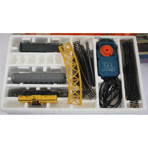 19 - A group of five boxed continental model railway sets, together with a battery operated model railway... 