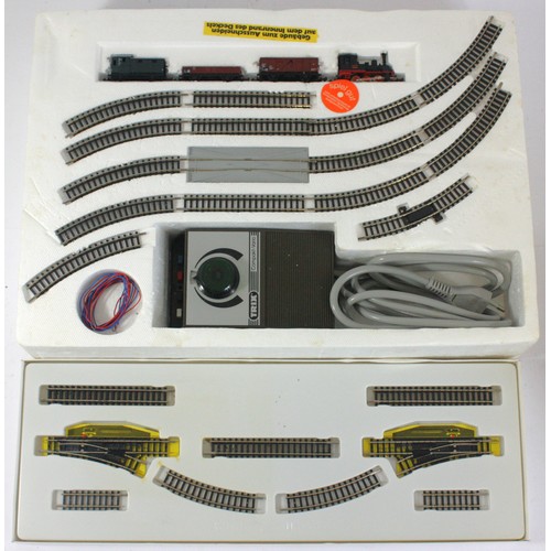 Minitrix N gauge goods train set with black 0-6-0T locomotive, three ...