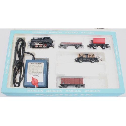 24 - Marklin Germany; Three electric model railway boxed sets, comprising set 2963 (incomplete) set 2911 ... 