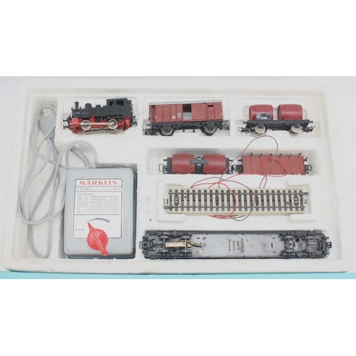 24 - Marklin Germany; Three electric model railway boxed sets, comprising set 2963 (incomplete) set 2911 ... 
