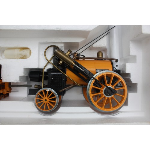 32 - A Hornby Railways 3½ inch gauge live steam Stephenson's Rocket locomotive and tender, boxed with tra... 