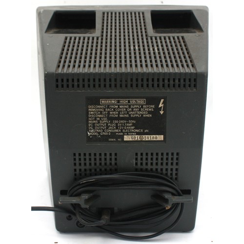 Three gaming related items to include an Amstrad GT65 Monitor, a boxed ...