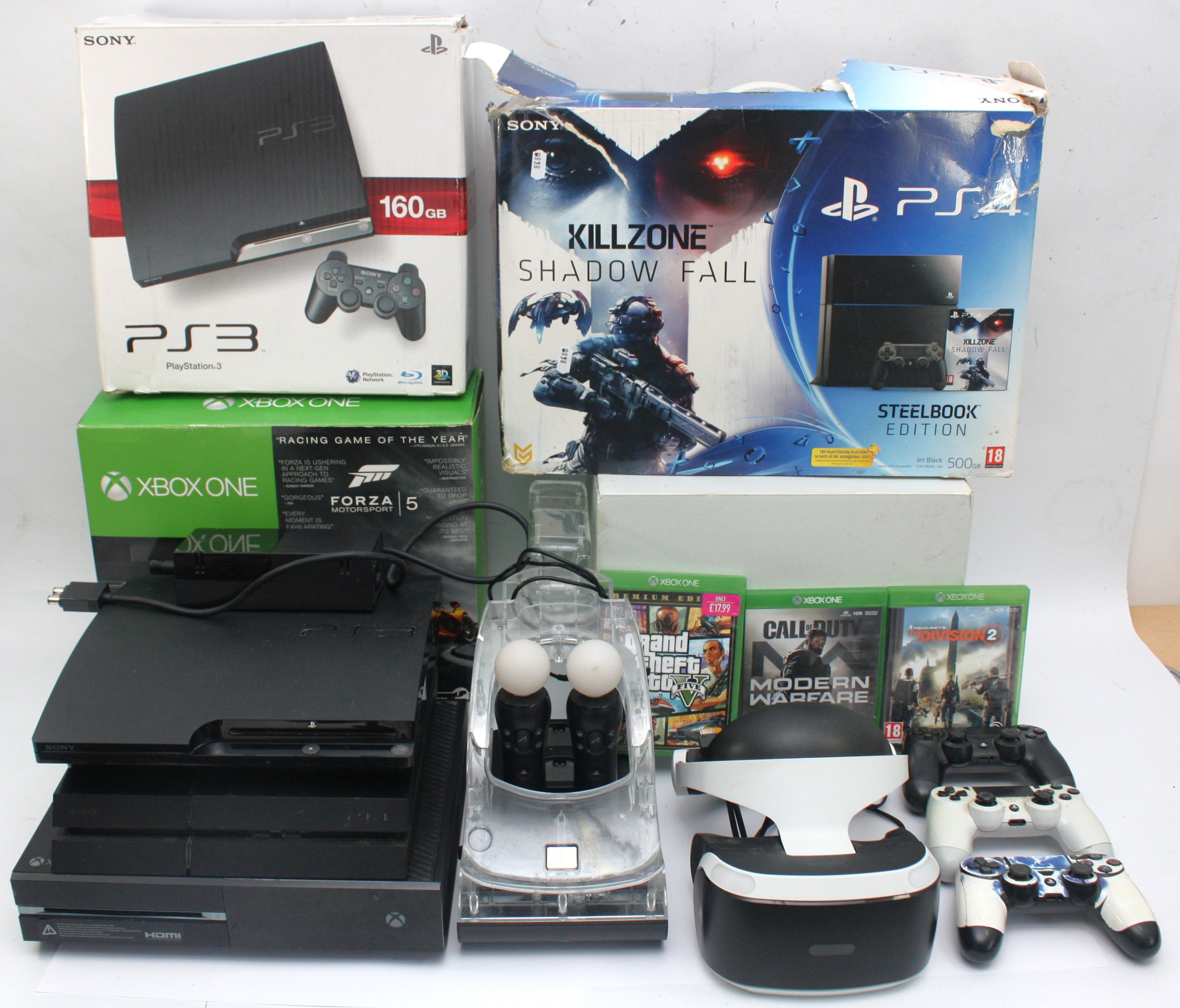 A collection of video game consoles to include a Playstation 3 (PS3 ...