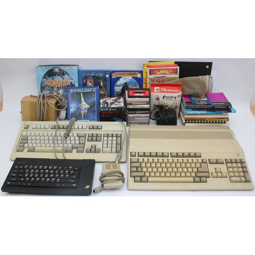 A collection of vintage computers and accessories to include, a ...