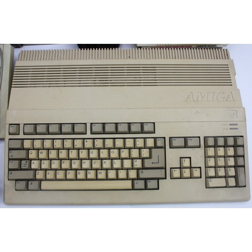 A collection of vintage computers and accessories to include, a ...