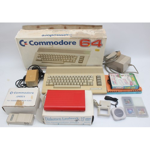 A collection of vintage computers and various electronics, to include a ...