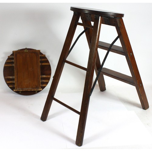 249 - A manual operated oak perpetual wall calendar with linen scroll for day, month and date 30.5cm diame... 