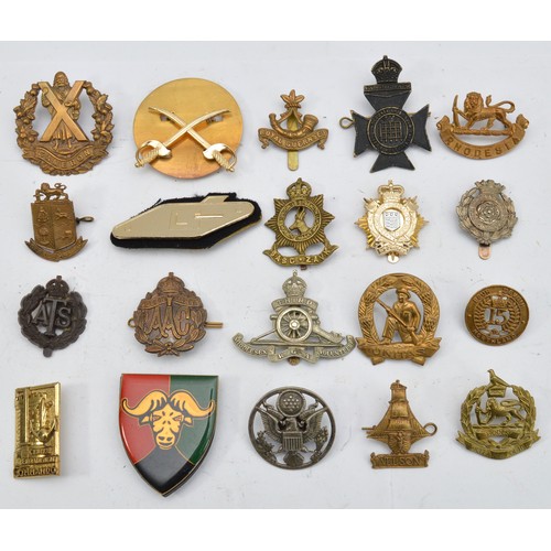 A collection of twenty military cap badges to include Q.M.A.A.C, 15th ...