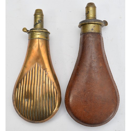 Two powder shot flasks to include a brass example by Sykes and leather ...
