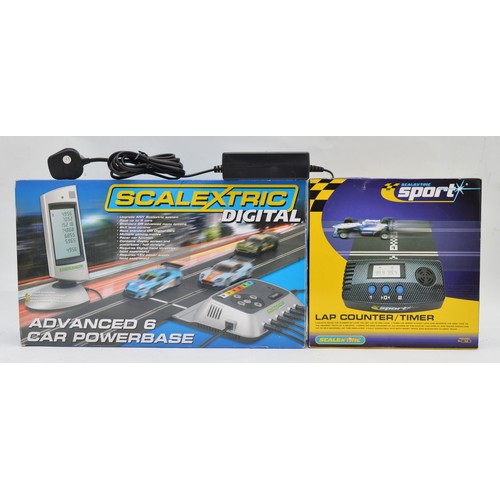 A Scalextric Digital advanced 6 car powerbase together with a ...