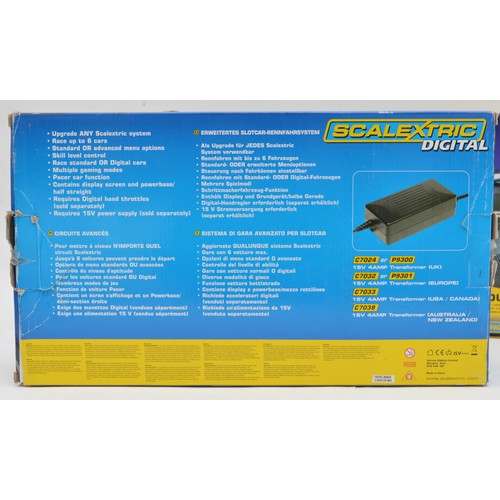 A Scalextric Digital advanced 6 car powerbase together with a ...