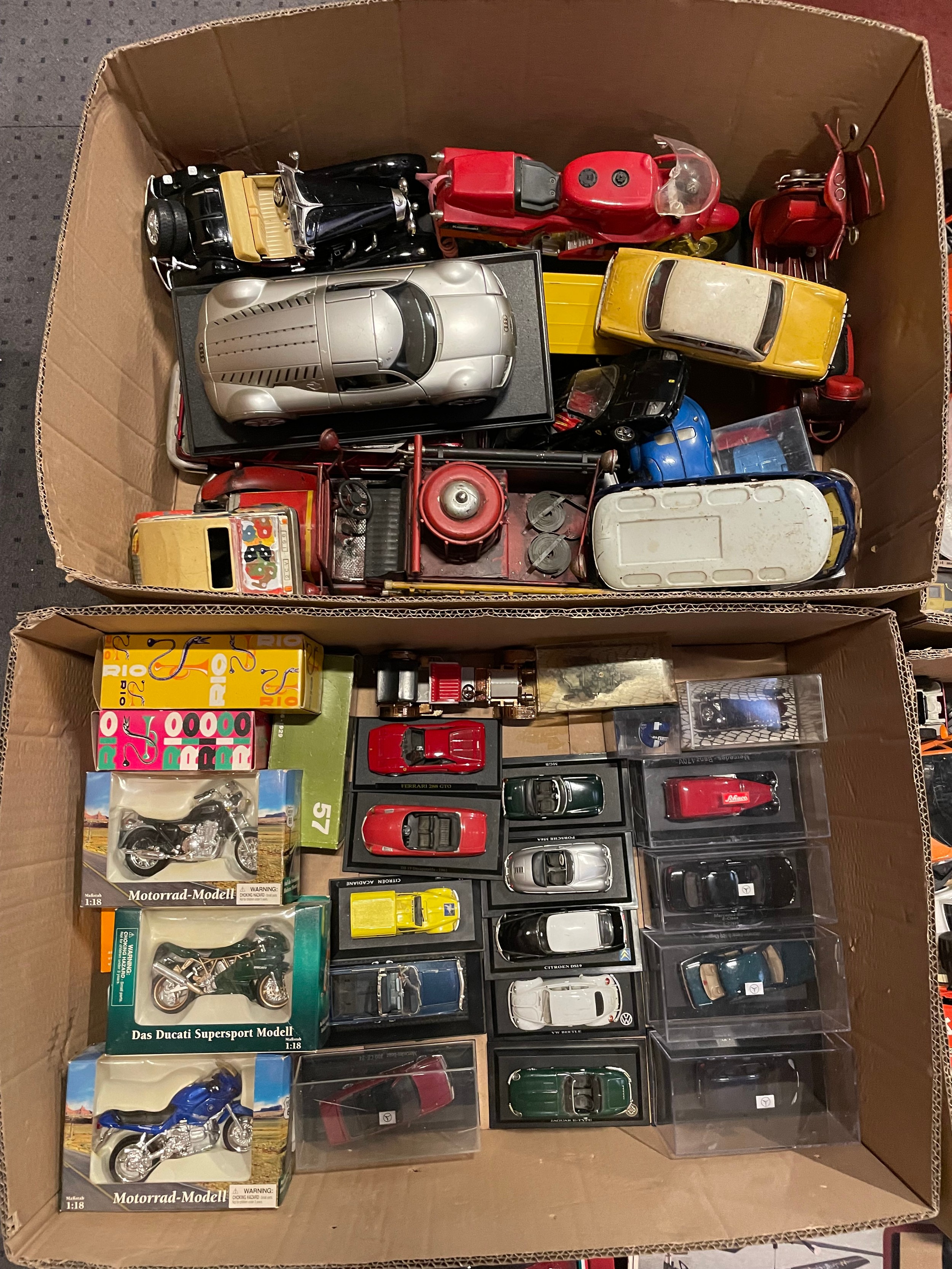 A large collection of vintage model toy vehicles, including a quantity ...