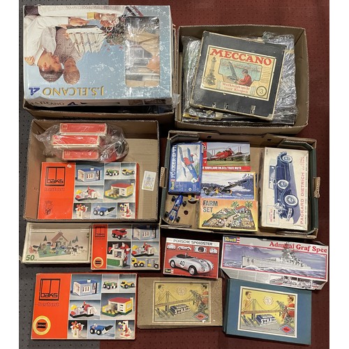 A collection of vintage toys and model kits, including Revell and ...