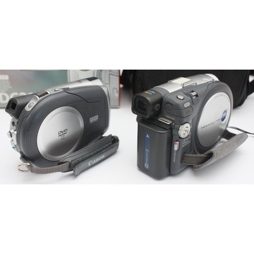 A boxed Canon DC211 camcorder and a Sony DCR-DVD201E camcorder. (1 box)