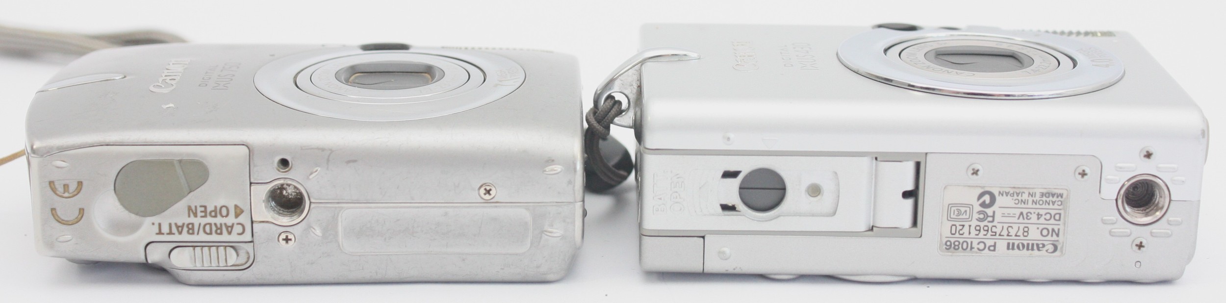 A Canon IXUS 430 digital camera and a Canon IXUS 750 digital camera. (2)