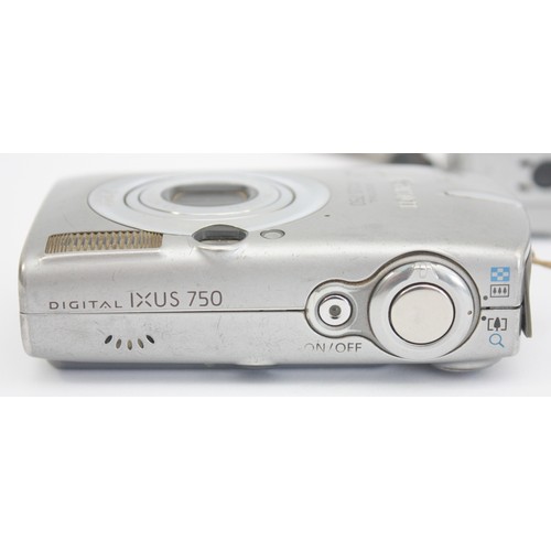 A Canon IXUS 430 digital camera and a Canon IXUS 750 digital camera. (2)