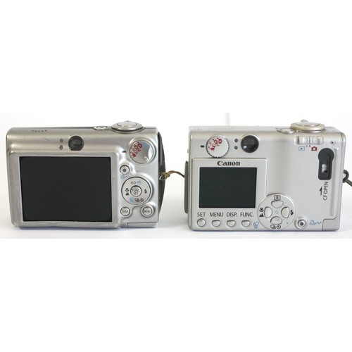 A Canon IXUS 430 digital camera and a Canon IXUS 750 digital camera. (2)