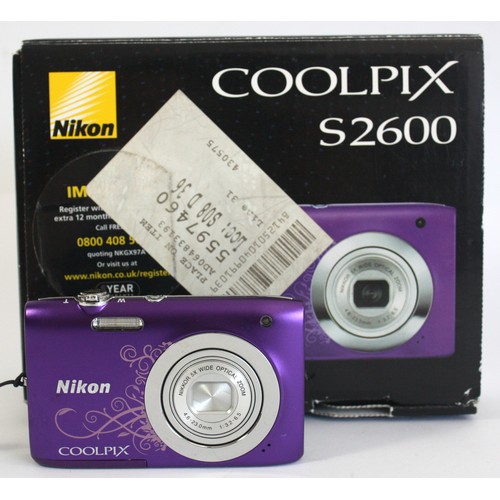 495 - A purple Nikon Coolpix S2600 digital camera, boxed, no charger.