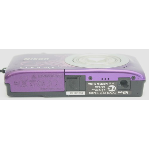 495 - A purple Nikon Coolpix S2600 digital camera, boxed, no charger.