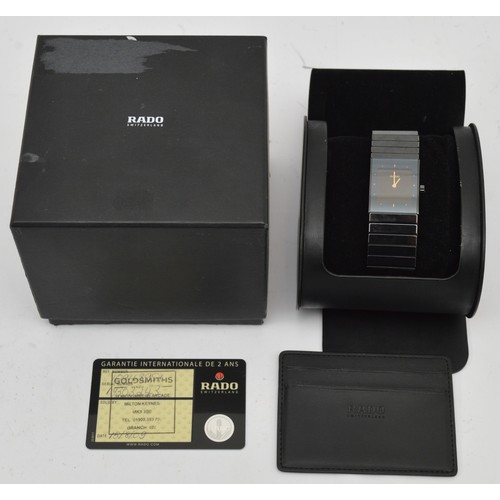 459 - Rado Diastar, a ceramic quartz ladies wristwatch, ref. 193.0342.3, black dial with gold tone batons,... 