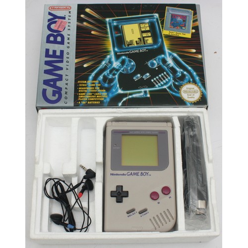A boxed Nintendo GameBoy, missing the Tetris video game. (1)
