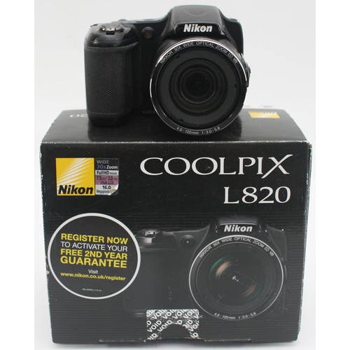 A boxed black Nikon Coolpix L820 digital camera.