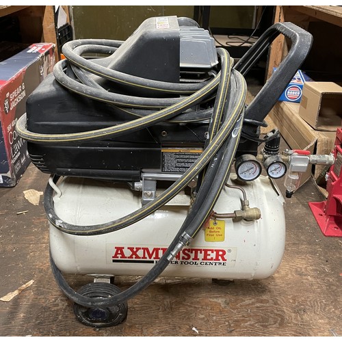 An Axminster AWC25HP compressor.