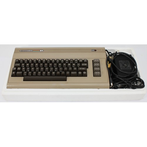A boxed Commodore 64 Micro Computer.