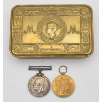 A WWI brass Queen Mary 1914 Christmas tin, 13 x 8.5cm, together