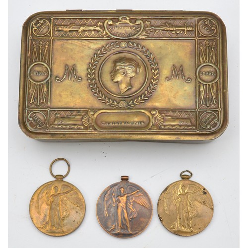 A WWI brass Queen Mary 1914 Christmas tin, 13 x 8.5cm, together