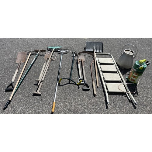 13 - A collection of gardening tools to include forks and spades. Together with a step ladder and a Gasco... 