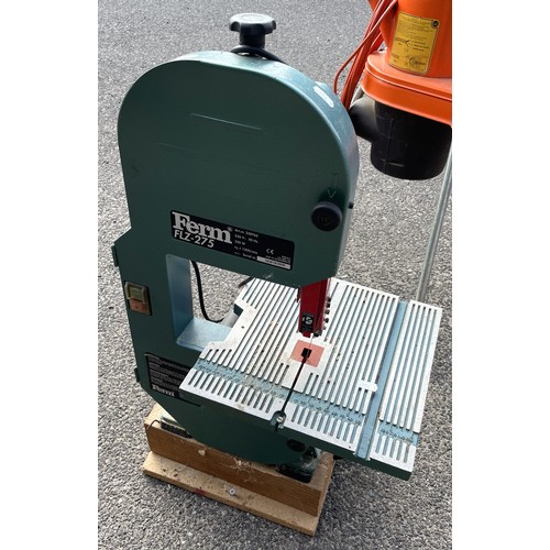37 - A Ferm FLZ-275 240v 350w bench top band saw together with an AL-KO H1100240v free standing garden sh... 