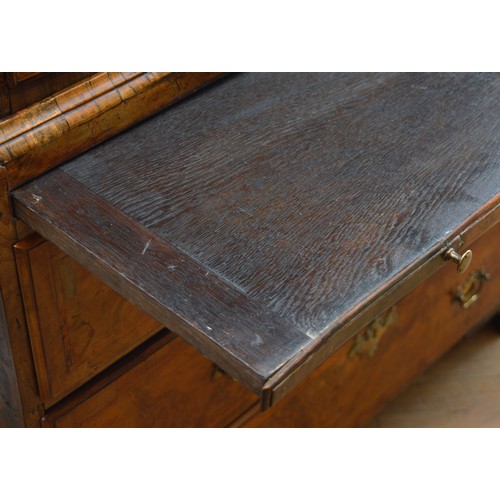  A George III Welsh walnut and oak tallboy, the later moulded cornice above three short and three lon... 