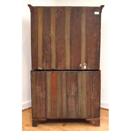  A George III Welsh walnut and oak tallboy, the later moulded cornice above three short and three lon... 