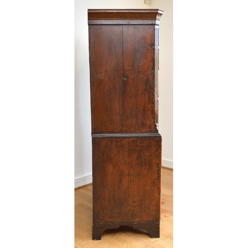  A George III Welsh walnut and oak tallboy, the later moulded cornice above three short and three lon... 