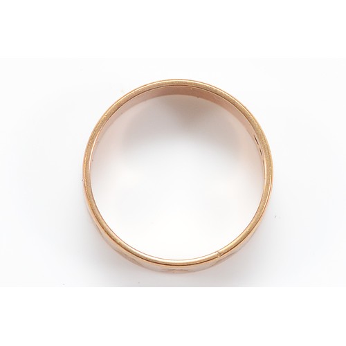2 - A 9ct gold engraved wedding band, 6mm wide, London 1967, N, 3.3g