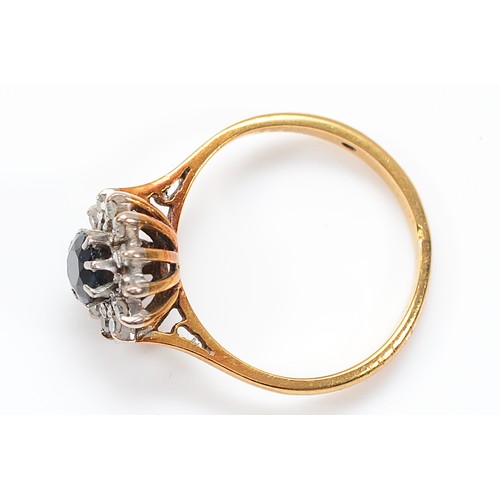 14 - An 18ct gold sapphire and single cut diamond cluster ring, London 1966, L 1/2, 3.3g