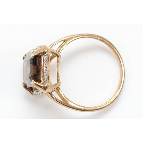 39 - A QVC 9ct gold smokey quartz and single cut diamond dress ring, Birmingham 2007, Q, 3.6g